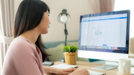 Woman working in home office.